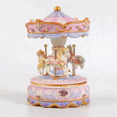 China Happy Romantics Go Around Glowing Musical Box Carousel Resin Music Box Birthday Gift For Kids for sale