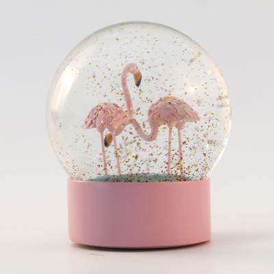 China Europe hot sale romantic water globe snow globe music box for sale