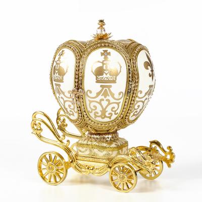 China Music box made of exquisite egg carving new style pretty egg carving music box jewelry box pumpkin carriage for sale