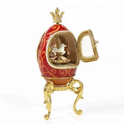 China Music box made of exquisite egg carving distinctive hand engraving goose egg music box faberge egg for sale