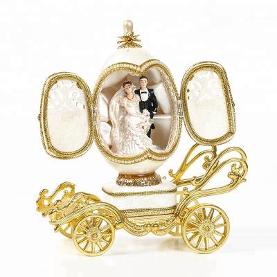 China Pure Natural Goose Egg Carving Europe Most Fashionable Souvenir Tourist Music Box for sale