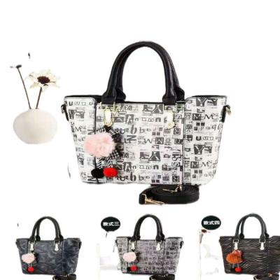 China Fashion 4.68 Dollar Model A8-016 Good Quality PU Leather Handbag Brave Man Women Bags With Different Colors for sale