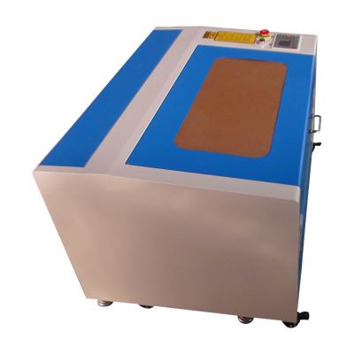 China Ruida System 3050 50w 60w Mini Desktop Laser Engraving Machine CO2 Laser Engraving Cutting For Non Wood Metal Acrylic Materials for sale