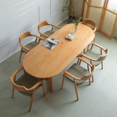 China Nordic Simple Modern Solid Wood Dining Table Oval Dining Table Set Luxury One Piece Wooden Dining Table Set for sale