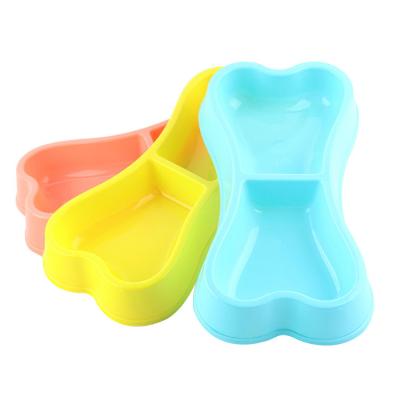 China Viable Bone Shape Double Dog Cat Bowl Plastic Food Dish Cute Pet Bowl Pet Feeder for sale