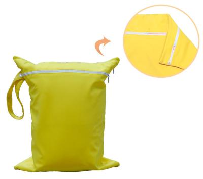 China Purpose Double Pockets Multifunctional Zippers Closure Wet Bags for Wet Diaper and Dry Diaper Mommy Diaper Wet Bags for sale