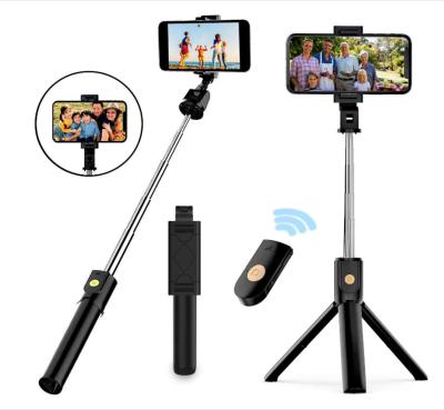 China The convenient hot style selfie stick tripod is convenient and practical and can be controlled wirelessly for sale