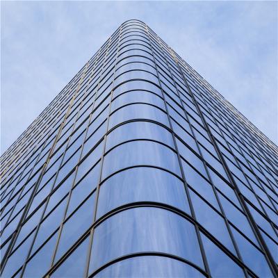 China Modern Curved Glass Curtain Wall System Bent Aluminum Facade With Double Tempered Tinted Triple Low E Glazing for sale