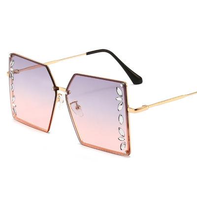 China New sports sunglasses fashion women's diamond lenses in 2021 European and American trend sunglasses foreign trade rimless sunglasses for sale