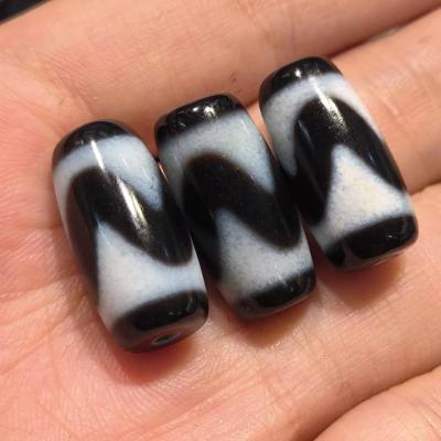 China Black and white accessories of old agate stone 1pcs/lot dzi tiger tooth core pattern natural high quality white rare varieties hole diy for sale