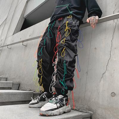 China Anti-Wrinkle Streetwear Custom Mens Sport Jogger Track Pants Multicolor Drawstring Bungee Cargo Pants Men for sale