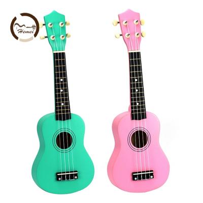 China Custom Made 21 High Quality Durable All Inch Solid Wood Nylon Student Wooden Guitar Basswood Soprano Ukuleles for sale