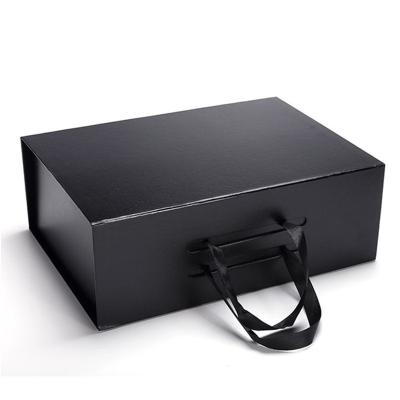 China Recyclable Luxury Hard Pure Black Magnetic Gift Box Cosmetics Corrugated Cardboard Gift Box for sale