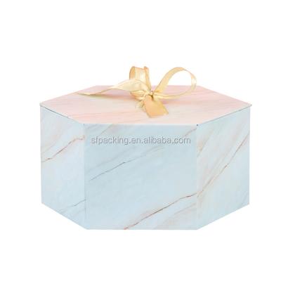 China Recyclable Customized Design Favor Hexagon Gift Box With Ribbon for sale