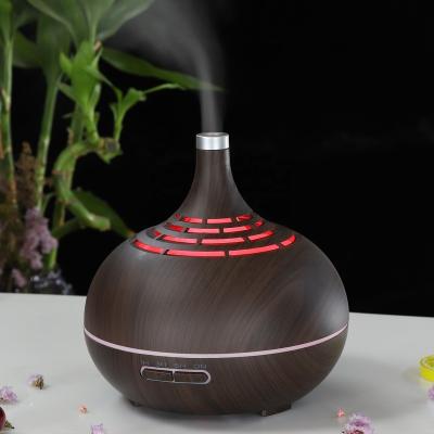 China Smell Comfortable New Model 400ml Wood Essential Oil Aromacares Diffuser Grain Aromatherapy Humidifier for sale