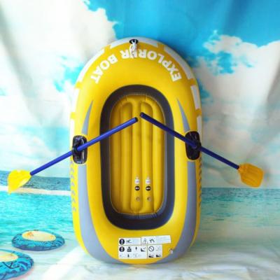 China Upgraded PVC thicken inflatable rubber kayak fishing boat with aluminum oars, cushion, rope, repair kits, and high output airpump for sale