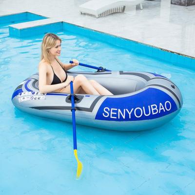 China Water Sports 1 Person Blue Color Thicken PVC Rowing Boat Inflatable Canoe With Plastic Paddle Leisure Entertainment Outdoor Water Sports for sale