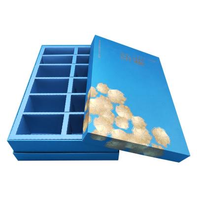 China Customized Materials Size 12 Medium Compartments Blue Recycled Packaging Boxes For Snacks Mooncake Chocolate Packaging for sale