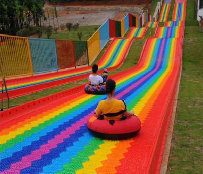 China Rainbow Color Dry Plastic HDPE Slide Piping Snow Amusement Park Skiing Artificial Slope With Snow Tube for sale