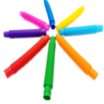 China Puzzle Entertainment Chinese Factory DIY Wholesale Multi Color Relaxing Stretch Whistle Sensory Wiggle Person Toy Pop Tube for sale