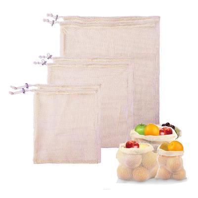 China Reusable mesh cotton fabric drawstring eco foldable organic fruit bags with drawstring for sale