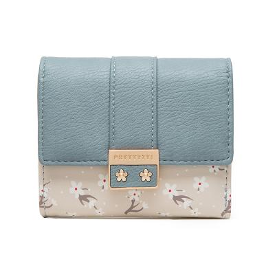 China Waterproof Huopo Leather 2022 New PU Wallet Flower Korean Print Buckle Large Capacity Student Short Coin Purse for sale