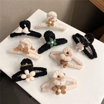 China Smart Casual Plush Hair Claw For Women Flocking Large Hair Claw Flower Shark Clip Plastic Hair Clips Geometric Square Clips for sale