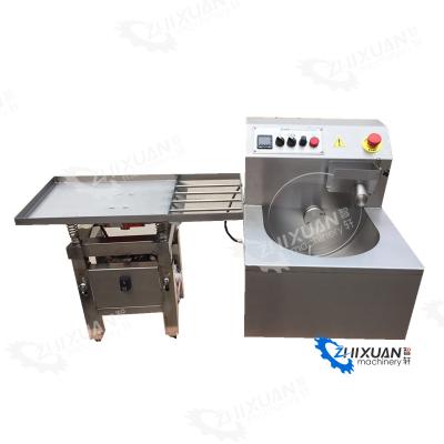 China Dairy Factory Small Chocolate Melting Pouring Molding Machine With Vibrating Table for sale