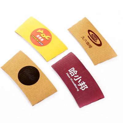 China Eco-friendly Recyclable Brown Kraft Paper Cup Sleeve Disposable Jacket For Coffee Cups With Custom Printed Logo for sale