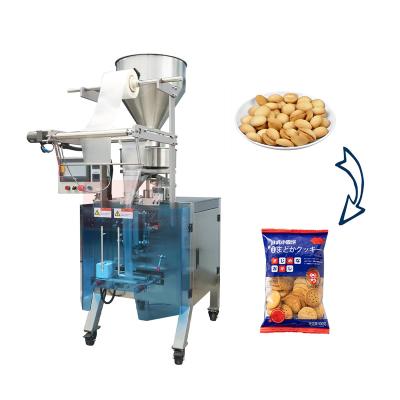 China Automatic Food Packaging Machine for Small Biscuits 15 Gram Bag Pellet Tooth Shaped Dispenser Snack Bagging Machine for sale