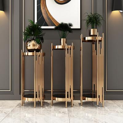 China Modern furniture factory direct sale metal gold color flower stand wedding decoration flower pot stand for sale