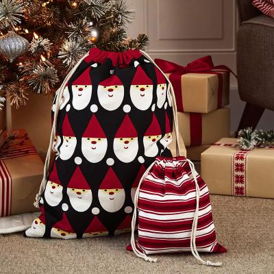 China Custom Eco-Friendly Santa Sack Sacks Cotton Sublimation Christmas Medium Large Small Many Designs With Drawstring for sale