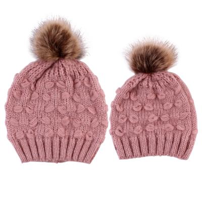 China COMMON Accessories Mommy and Me Winter Fashion Knit Beanie Hats Adult Baby Warm Hats Beanies With Hairball for sale