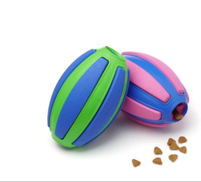 China Sustainable Customizable Indestructible Permeable Cavity Double Layer Rugby Ball Toy Natural Rubber Pet Squeaky Chew Ball for sale