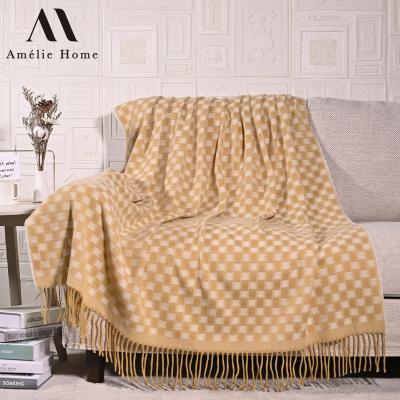 China Amelie Home Wholesale Acrylic Woven Anti-Static Throw Blanket with Tassels Soft Designer Plaid Blankets for sale