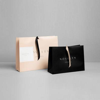 China Boutique Custom Printed Recyclable Retail Shopping Gift Small Black Paper Bag With Your Own Logo for sale