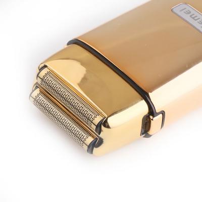 China Main Shaver KM-TX1 Fashionable Comfortable Floating Dual Blades Using Electric USB Charging Men Gold Portable Shaver for sale