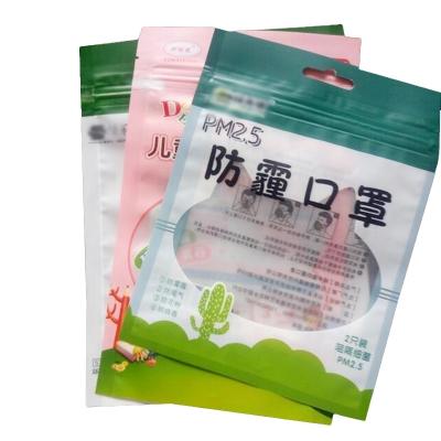 China Hot Sale Impact Resistance 3 Sides Sealing Matte Biodegradable Environmental Face-mask Packaging Bag With Hanging Holes for sale