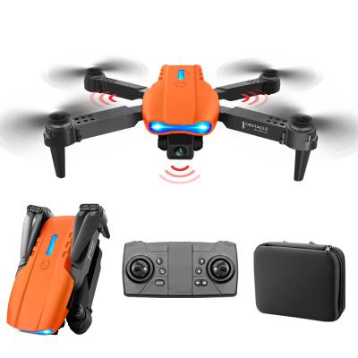 China Three Side Obstacle Avoidance UAV Airplane Photography Aircraft Camera 4k HD Radio China Newest E99 Tracing Orange FPV Drones Con Camara Quadcopter à venda