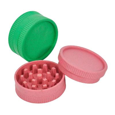 China Minimalist Colorful Black Green Pink Plastic Herb Grinder Weed Smoke Blue 63mm Hand Tobacco Grinder for sale