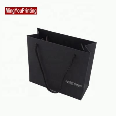 China Recyclable Black Kraft Paper Bag For Shopping With Silver Logo for sale