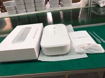 China The main mobile phone 2022 available customized popular logo box 15w UV smart phone sterilization wireless charger for sale