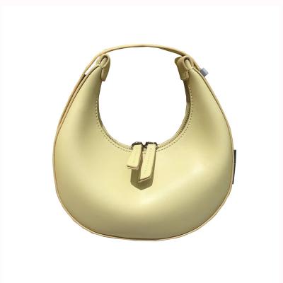 China 2021 New Niche Design Mini Moon Bag GENUINE LEATHER Shoulder Bag Portable Round Purse Armpit Crescent Female Leather Bag for sale