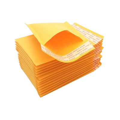 China Wholesale Price Cosmetics Yellow Kraft Mailing Mailing Mailing Mailer Bags With Bubbles for sale