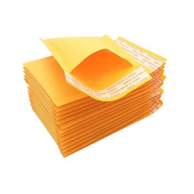 China Hot Sale Waterproof Thickening Cosmetics Packaging Paper Yellow Ad Bags With Bubble for sale