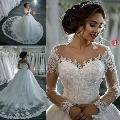 China Plus Size Wedding Apparel And Accessories 2022 New Dubai Elegant Long Sleeves Sheer A Line Lace Appliques Crew Neck Wedding Dresses Dubai Long Sleeves Beaded for sale