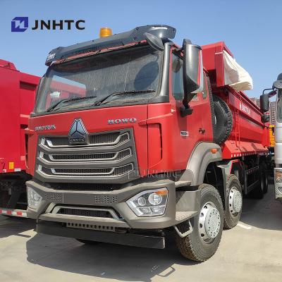 China Nieuwe en gebruikte Sinotruck HOWO Nx 8X4 Dump Truck 50 ton Nieuwe Truck Met Tarpaulin Te koop