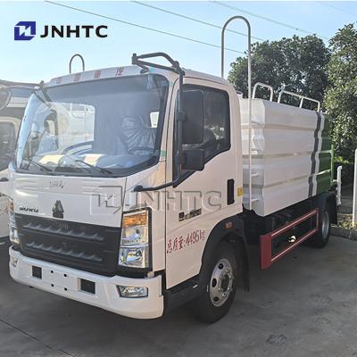 China HOWO Mini 3000L Water Truck With Fog Cannon Multi Functional Dust Suppression Truck For Mining for sale