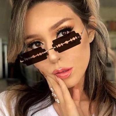 China UV-400 new 2022 gradual change sunglasses blade glass women tend personality piece frameless uv400 sunglasses for sale