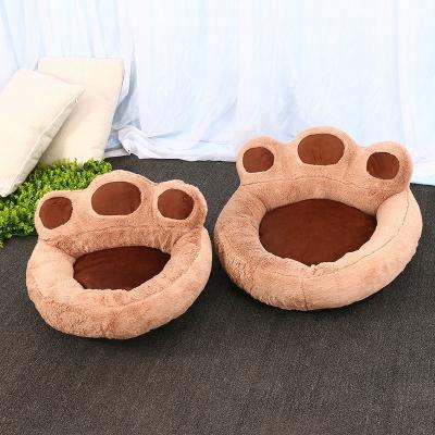 China Viable Dog Sofa Bed Paw Shape Pet Bear Product Warm Soft Pet Cat Dog Kennel for sale